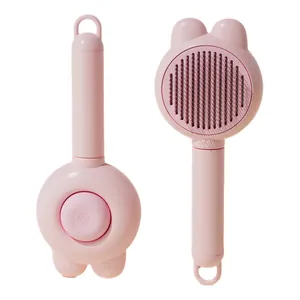 Jolie brosse de toilettage rose pour animaux avec oreilles de lapin et picots inox