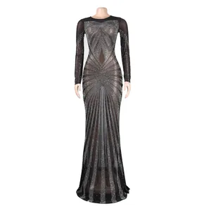 Detail view of a sexy black floor-length gown with sparkling rhinestones on mannequin