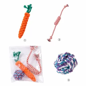 Macro view of a 3-piece dog chew rope toy set featuring carrot, ball and knot designs