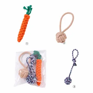 A three-piece set of braided dog rope toys for teething shown in clear packaging
