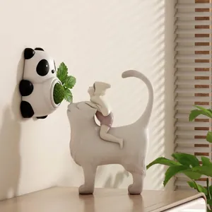 Adorable panda-shaped rotating catnip ball toy for indoor cats, wall-mounted design