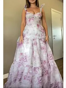 Elegant floral organza evening gown with off-shoulder straps and tiered layered skirt