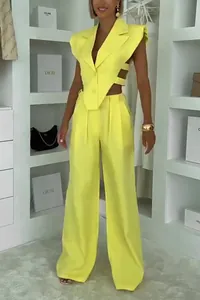 Chic yellow sleeveless cutout vest and matching wide-leg trousers two-piece outfit