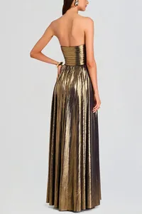 Detailed back view of a metallic gold strapless evening gown with elegant pleated texture.