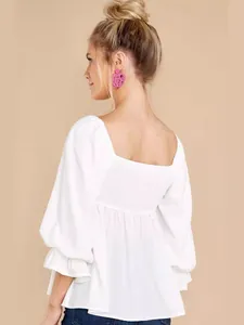 Elegant white square neck blouse featuring puff sleeves and a smocked back detail for women