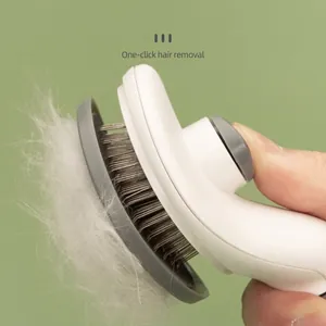 Cepillo automático blanco y gris para eliminar pelo de mascotas con botón de clic