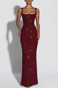 Full detailed look of a burgundy sequined floor-length evening gown with square neckline