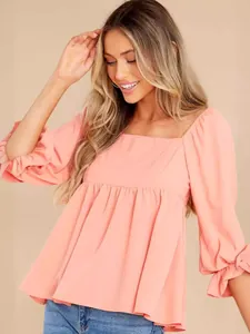 Elegant peach square neck blouse with 3/4 puff sleeves and ruffled cuffs for women