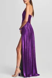 Elegant purple metallic evening gown with side slit, pleated details and strapless design