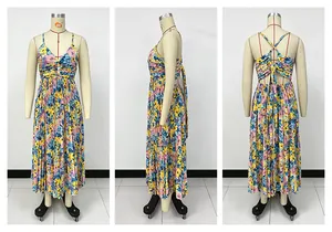 Multi-angle views of a floral V-neck pleated maxi dress with crisscross back