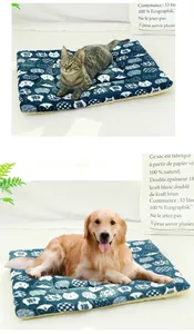 Macro view of a thickened plush pet mat with cute cat patterns for dogs and cats.