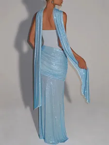 Light blue sequined sleeveless evening gown featuring long draped streamers for parties