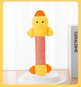 Detail view of plush squeaky duck toy for dogs with a long striped neck on display stand