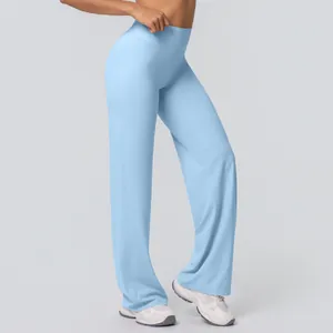 Full side view of light blue high waist wide leg yoga pants showing soft texture