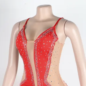 Detailed front view of a sexy red rhinestone strap dress with sheer mesh panels.