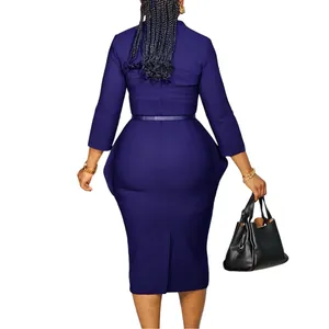 Back view of elegant navy long-sleeved pencil dress with waist belt and side ruffles.