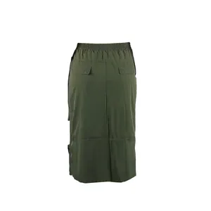 Detailed back view of olive green cargo skirt with elastic waist and functional back pockets.