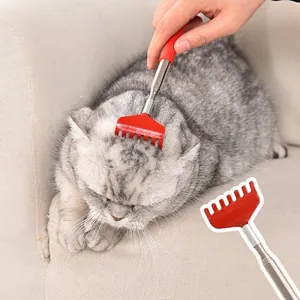 Red telescopic cat scratching tool and grooming brush with long handle for pets
