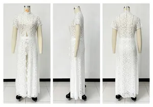 Detailed view of elegant white lace maxi dress featuring round neck and front slit