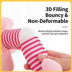 Plush squeaky dog toy with red and white stripes and soft elastic filling.