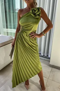 Detailed view of lime green one-shoulder pleated dress with 3D flower and cutout.