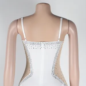 Back view detail of white sexy sheer dress with rhinestones and thin spaghetti straps.