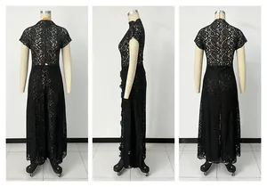 Detailed view of black lace hollow out maxi dress with round neck and short sleeves.