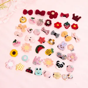 Set of cute assorted cartoon fabric pet hair clips with flowers, fruits, and animal shapes