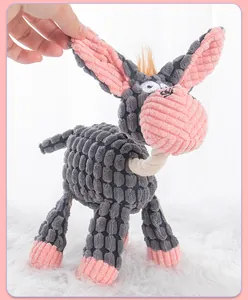 Close-up of plush donkey dog toy with durable corduroy texture and cotton rope