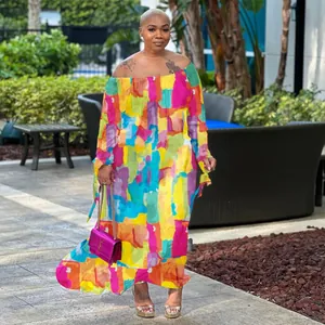 Vibrant off-the-shoulder maxi dress featuring a bold abstract colorful print design.