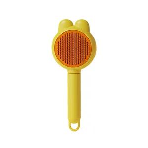 Yellow pet grooming brush with rabbit ears and self-cleaning stainless steel needles