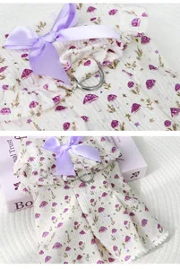 Mushroom print pet dress with harness ring and lavender bow detail for cats and dogs.