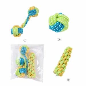Dog rope toy set including ball, dumbbell and stick shapes in retail packaging