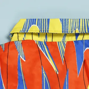 Detailed macro shot of vibrant abstract pattern on the collar of a slim fit colorful dress