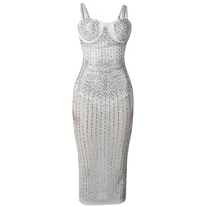 Abito bodycon trasparente bianco con strass brillanti e corpetto in stile bustier