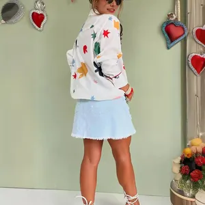 Fashionable white long sleeve shirt with colorful star and sun prints for casual wear