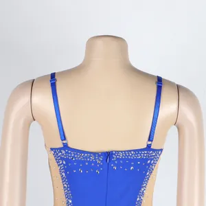 Detail of blue evening dress back with rhinestones and adjustable straps.