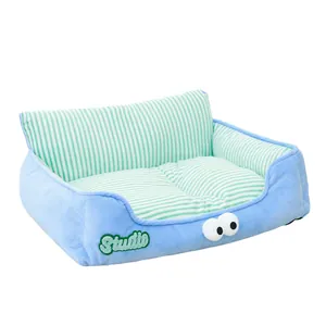 Soft blue pet sofa bed with green striped interior for small dogs and cats