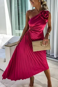 Detailed side view of fuchsia one-shoulder pleated midi dress with 3D floral accent.