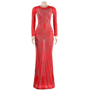 Elegant red floor-length evening gown with intricate silver rhinestone patterns.