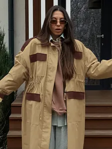 Full-length view of a British retro khaki trench coat with brown color-block details.
