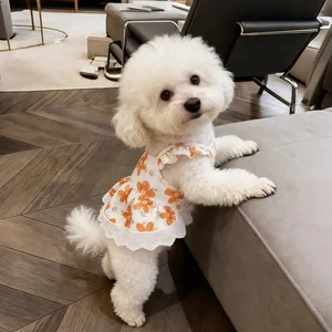 Elegant white floral print dog dress featuring flutter sleeves and lace trim for small pets