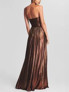 Elegant strapless metallic bronze maxi dress for evening parties and special events.