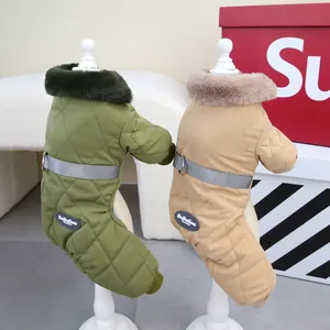 Quilted winter dog coats with warm faux fur collars shown on white dog mannequins.