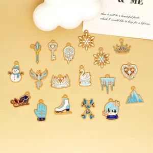 Detailed shot of winter-themed enamel charms featuring snowflakes and skates for DIY