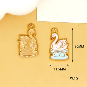 Close-up detail view of winter swan enamel pendant with 20mm height and 11.5mm width