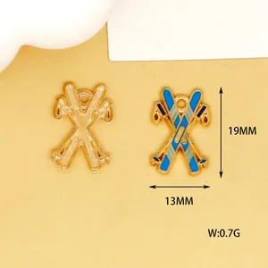 Detail view of blue enamel ski charm showing 19x13mm size and 0.7g weight parameters.