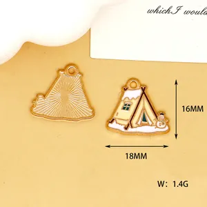 Macro detail of 18mm winter tent enamel charm showing front design and back texture