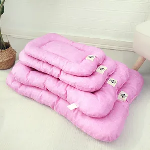 Stack of breathable pink linen pet mats for dogs and cats available in four sizes