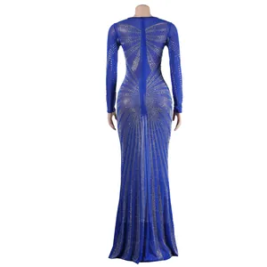 Back view of a sexy royal blue floor-length evening gown decorated with rhinestone patterns.